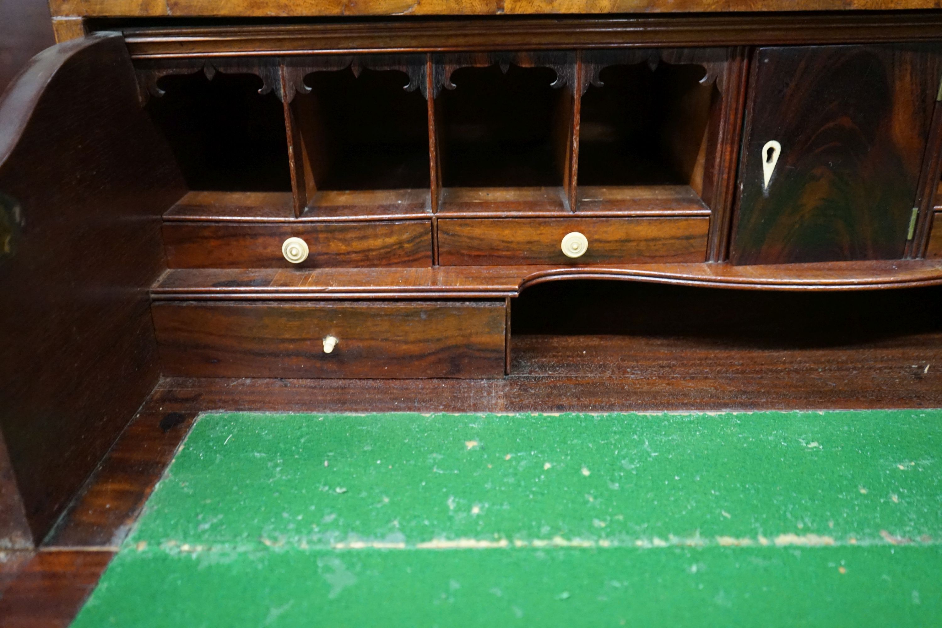 An early 19th century inlaid mahogany secretaire bookcase, length 103cm, depth 53cm, height 221cm